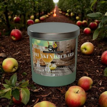 Light up your space with the playful scent of the Drunken Orchard 9-ounce candle. Blending crisp app