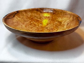 Bowl #129: 16” X 5”. Large, beautiful, cherry burl with blue epoxy. Rare piece. $250