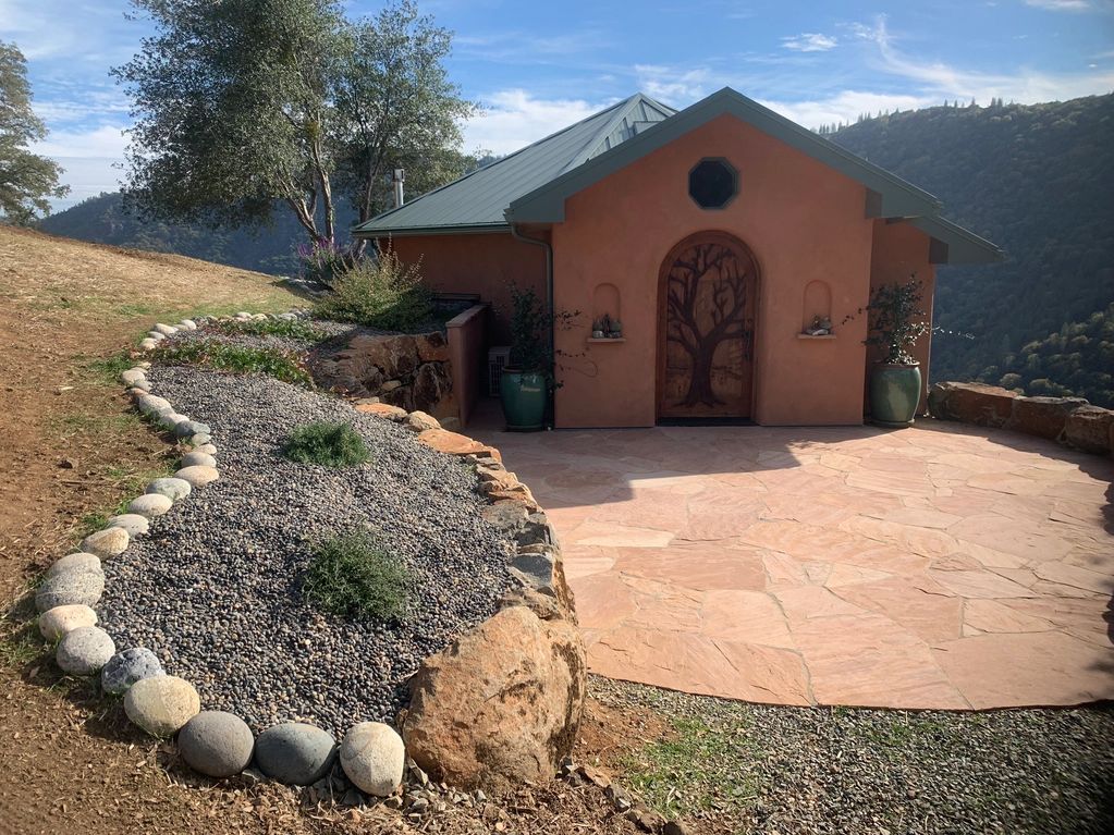 Finished Installation: Weed-block, native & medicinal fire-safe plants, auto-irrigation & stonescape