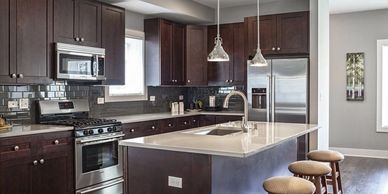 Cabinetry, JSI Cabinets, Bridgewood Cabinets, Wood cabinets, Countertops, Flooring