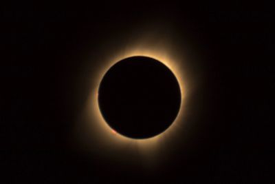Solar eclipse showing the sun's corona.