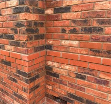 Red brick wall with detailing