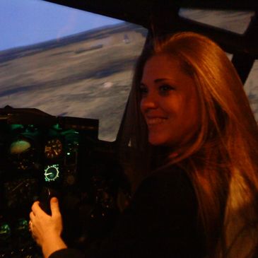 DC flying C-130 cargo plane in an actual Air Force simulator. Banking right.