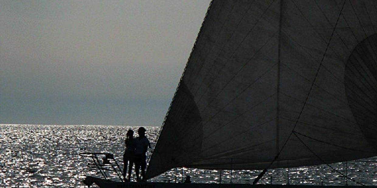 sailboat during sunset