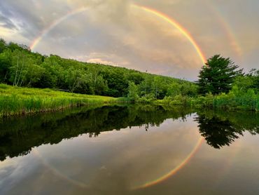 Scenic pond and mountain reflection at a Catskills wedding venue near Callicoon and Hancock