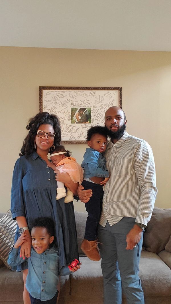 Owner of Light Shine Creations poses with family.