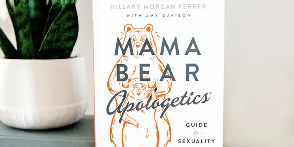 Book titled 'Mama Bear Apologetics' with a bear illustration on the cover.