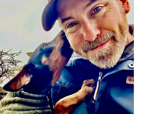 dog trainer Brian Merrill with dog