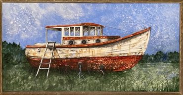 “October Alight” 
An old wooden boat, up on stilts is lit in late fall crisp light with bright orang