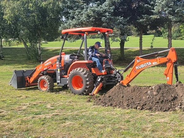 Larry on the backhoe