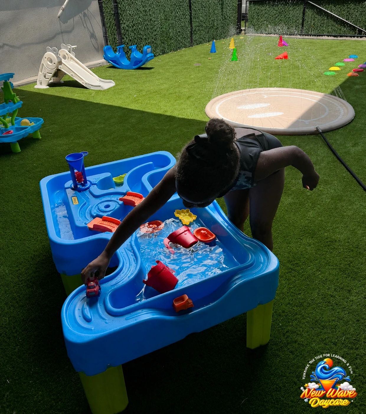 Summer camp activities  including water sports and outdoor fun at New Wave Daycare in Bayonne NJ