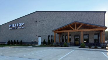 Exterior of Hilltop Bible Fellowship building in daylight.