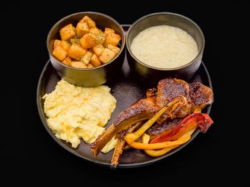 3 grilled lamb chops/potatoes or grits/eggs*