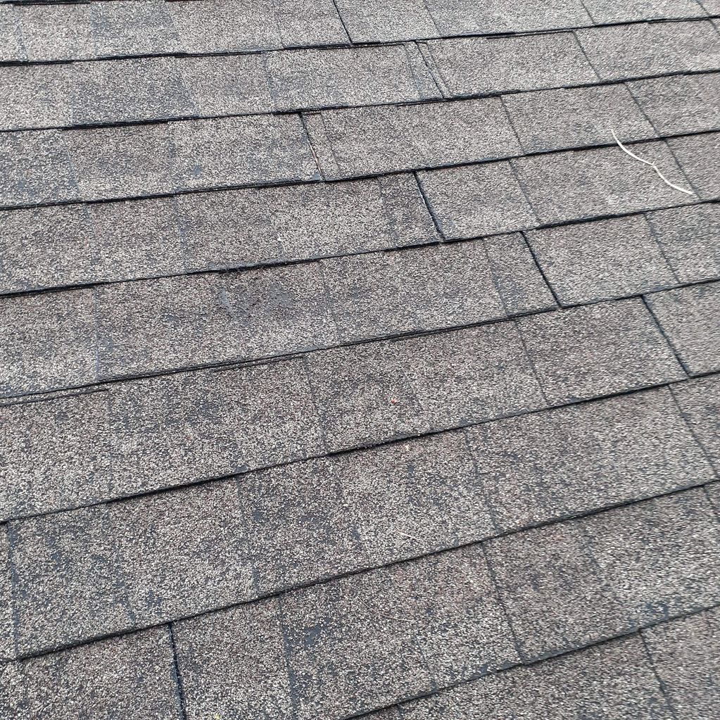 Shingles are worn and need to be replaced on home.