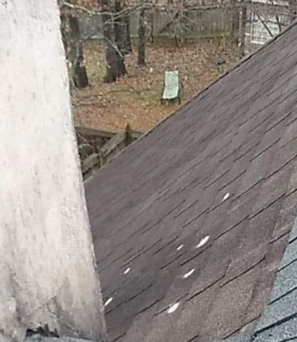 A hole has opened up at the base of a chimney at roof line allowing water to enter home.