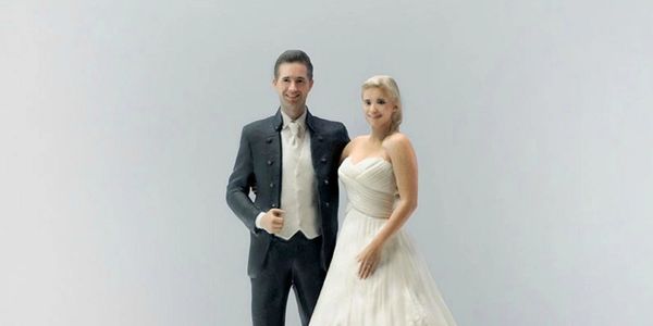 A 3D printed bride and groom.