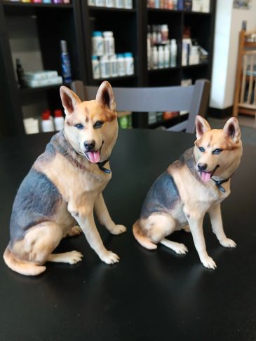 A pair of 3D printed dogs.