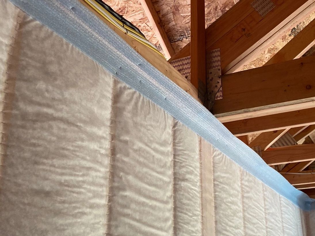 Sill seal installed at top plates to make an air-tight gasket for drywall