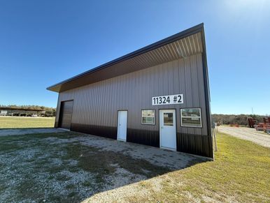 Metal building with door number 11324 #2.