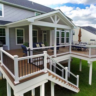 Raised deck with covering and stairs
