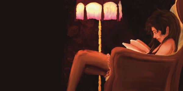 A woman reads a book under the soft glow of a vintage lamp.