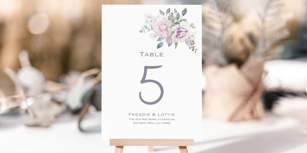 Elegant floral table number 5 card for a wedding.