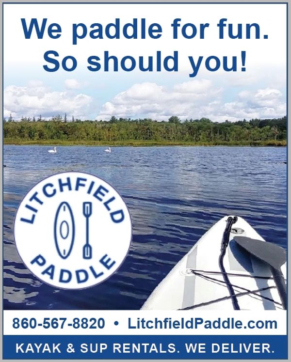 Kayak on calm water with ad for Litchfield Paddle rentals and delivery.