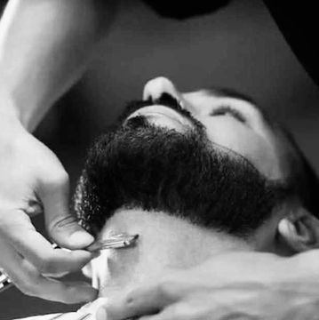 Detailed beard work with shaping, edging, and style for a sharp finish.