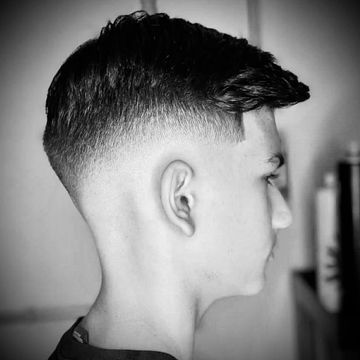 Sharp fade with smooth razor finish for a modern cut that stands out.