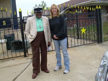 With Fats Domino in New Orleans, in front of his house after Katrina.