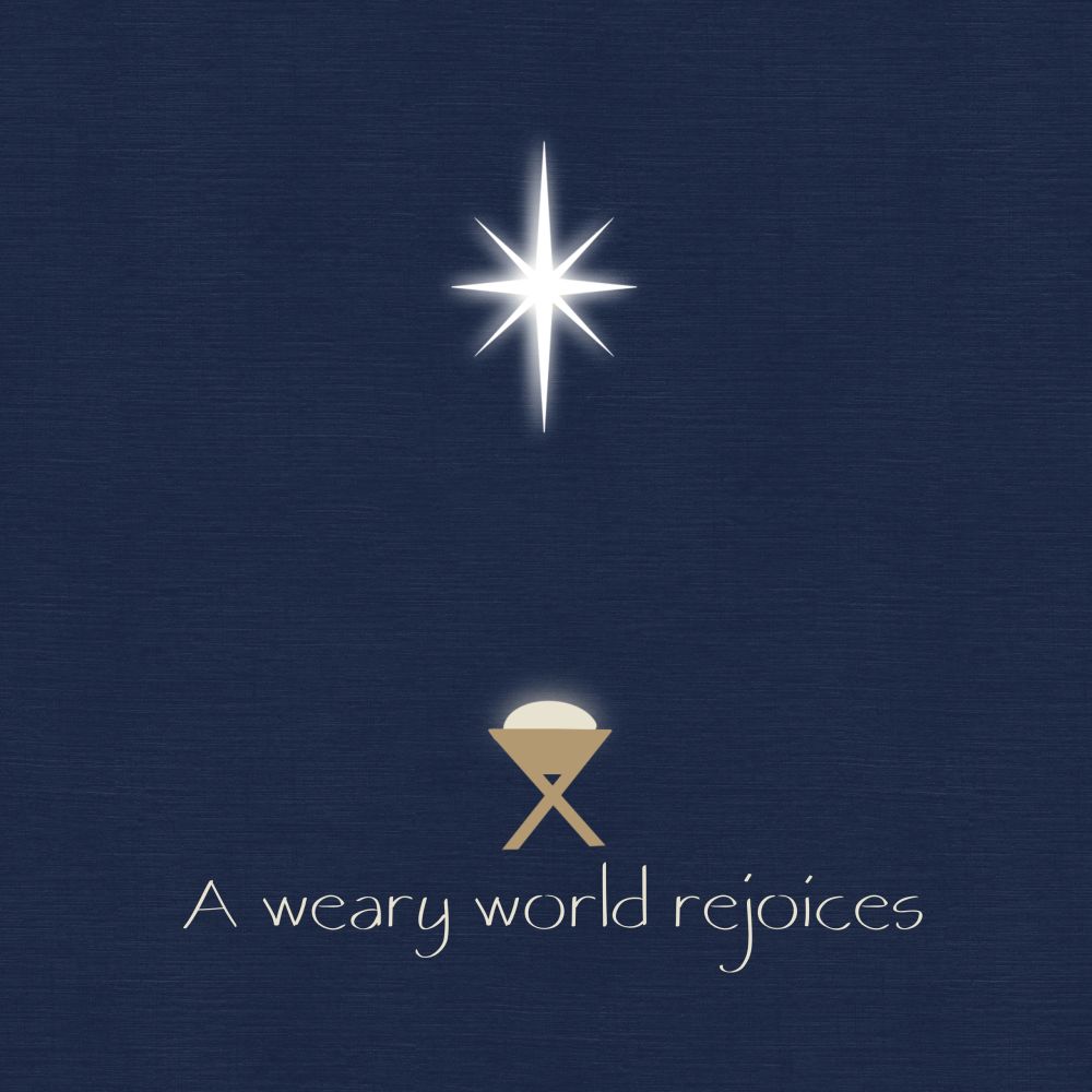Navy blue Christmas card featuring a bright star, manger, and the words A Weary World Rejoices.