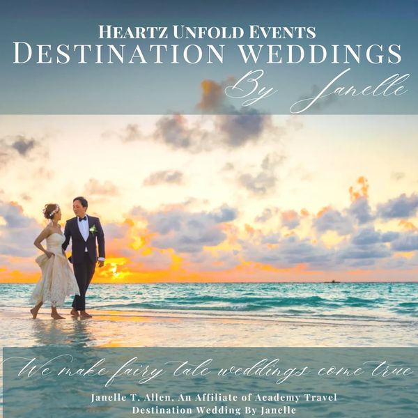 A couple walks on the beach at sunset for a destination wedding.