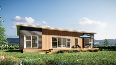 Modern small house with a wooden exterior and a deck.