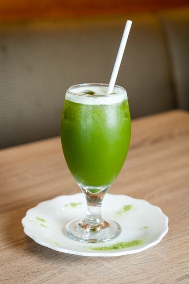 A Glass With Green Color Juice