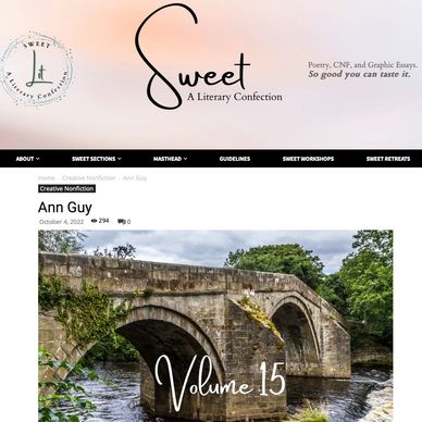 A stone bridge over a river.
