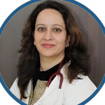 Professional female doctor with stethoscope smiling confidently.