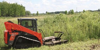 Skid steer brush hog land clearing