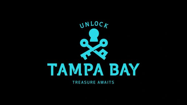 Logo with crossed keys and keyhole, saying 'Unlock Tampa Bay, Treasure Awaits'.