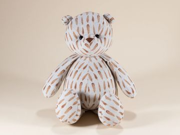 Brown feather pattern teddy bear