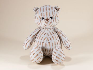 Brown feather pattern teddy bear