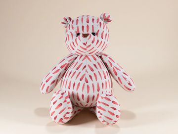 Red feather pattern teddy bear