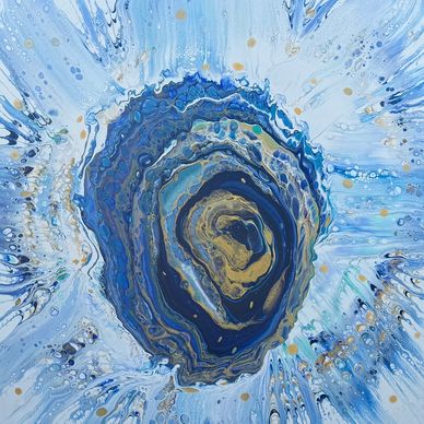 Abstract blue and gold fluid art swirl.