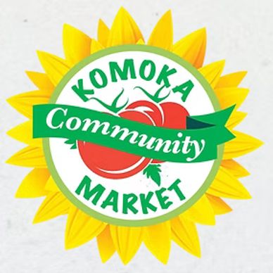 Logo of Komoka Community Market with sunflower and tomato design.
