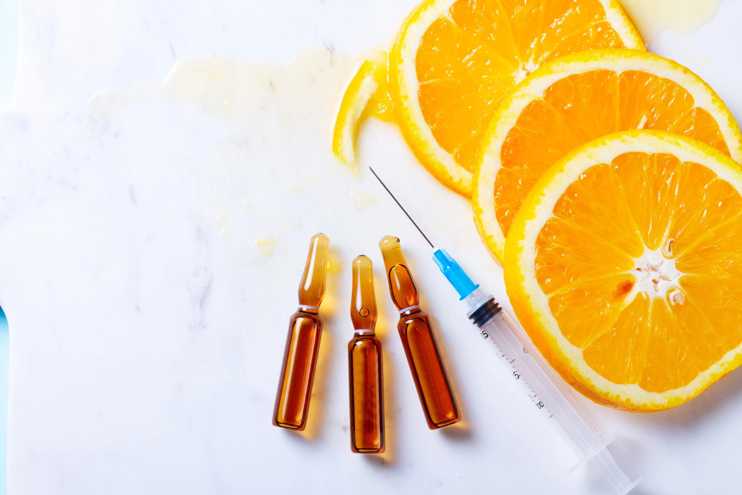 Orange slices and injections in the image