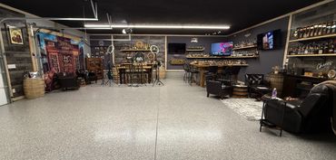 Spacious, stylish bar and lounge area with modern decor and cozy seating.