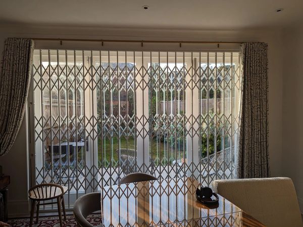 Expandable security gates London professionally installed for residential and retail premises