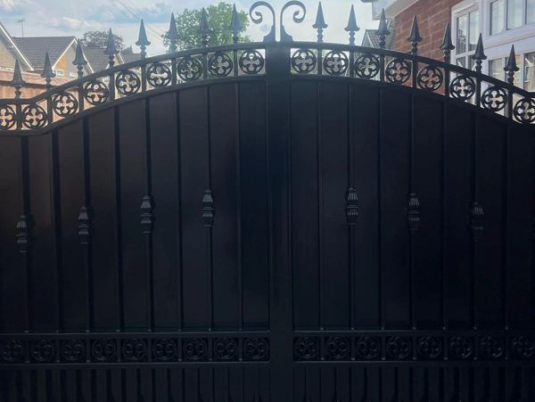 Residential driveway gates London custom manufactured with decorative steel gate design