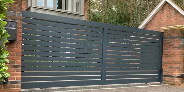 Black steel driveway gates London custom built for security, privacy and kerb appeal