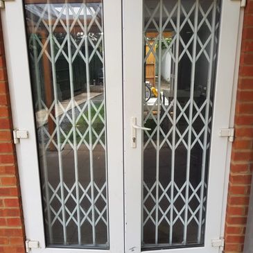 Retractable collapsible security gates London fitted for residential and business protection