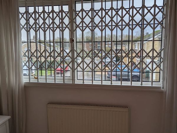 Sliding collapsible security gates London fitted for commercial and residential properties
